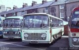 Rennison's Tours 154 na cidade de Scarborough, North Yorkshire, Inglaterra, por Donald Hudson. Número da foto: #5725055.